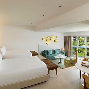 Deluxe Suite Double Beds Sofa Bed